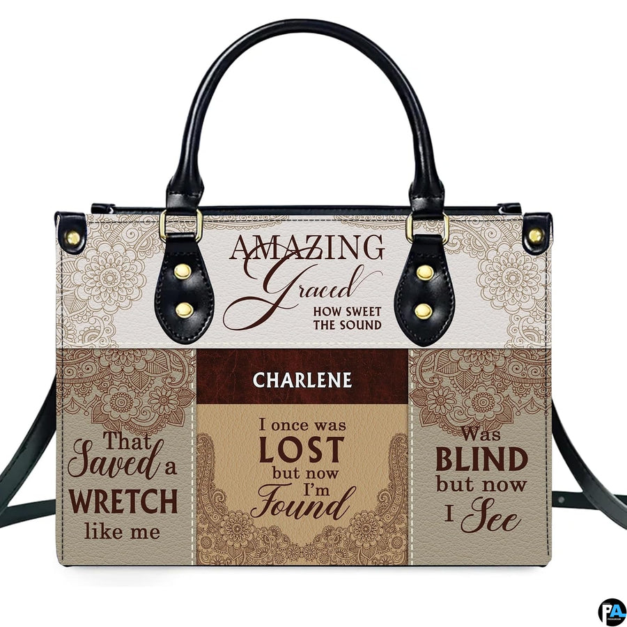 Detailed view of matching wallet featuring hymn typography and lace design