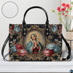Model walking outdoors carrying Baroque framed Virgin Mary devotional handbag.