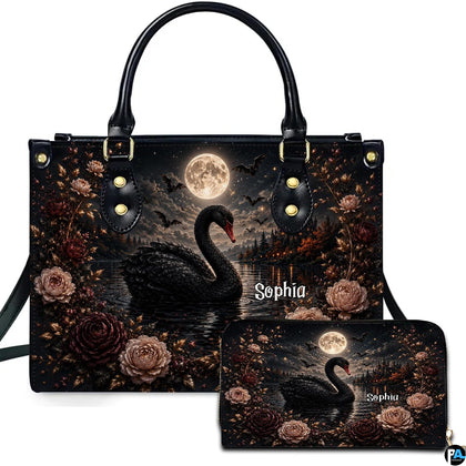 Black swan art portraying an elegant waterfowl on a nocturnal lake presented across an accessory pairing.