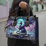 Outdoor lifestyle shot of model carrying gothic dragon fantasy handbag.