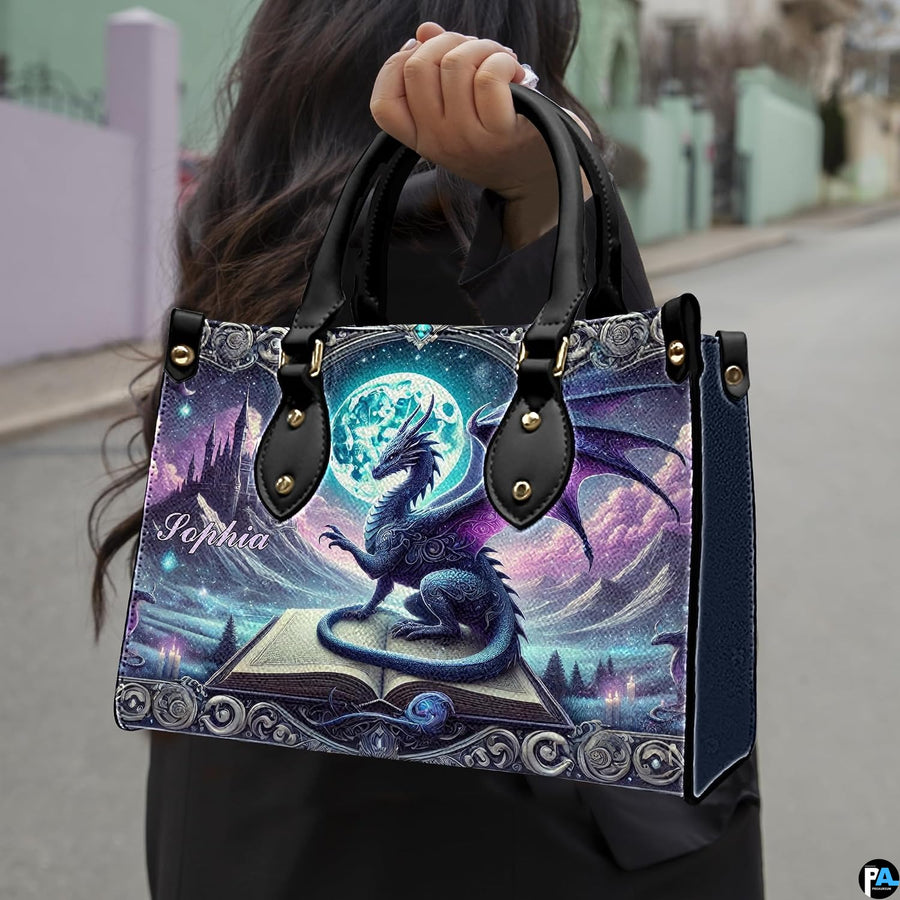 Outdoor lifestyle shot of model carrying gothic dragon fantasy handbag.