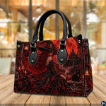 Witch crystal ball handbag on white table beside floral bouquet with texture swatch inset.
