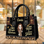 Christian nurse handbag shown on wooden tabletop with cafe background lighting.