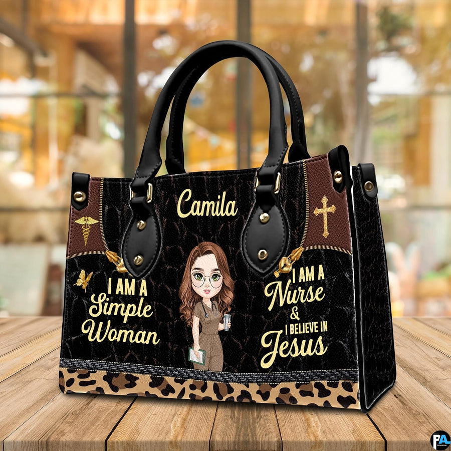 Christian nurse handbag shown on wooden tabletop with cafe background lighting.