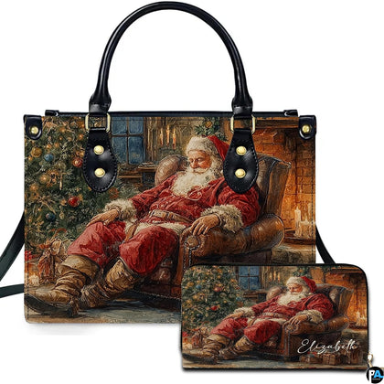 Front view of holiday handbag featuring sleeping Santa Claus by cozy fireplace and Christmas tree