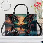 Close-up front view of matching sunset butterfly wallet