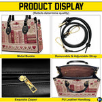Top-down view of the handbag highlighting clean upper lines and dual carrying handles.