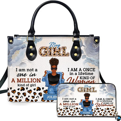 Afro puff art accessory and companion piece depicting illustrated lady, blue watercolor florals, and leopard hearts.