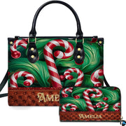 Front view of holiday accessory set showing peppermint candy canes, emerald foliage, and quilted panel styling.