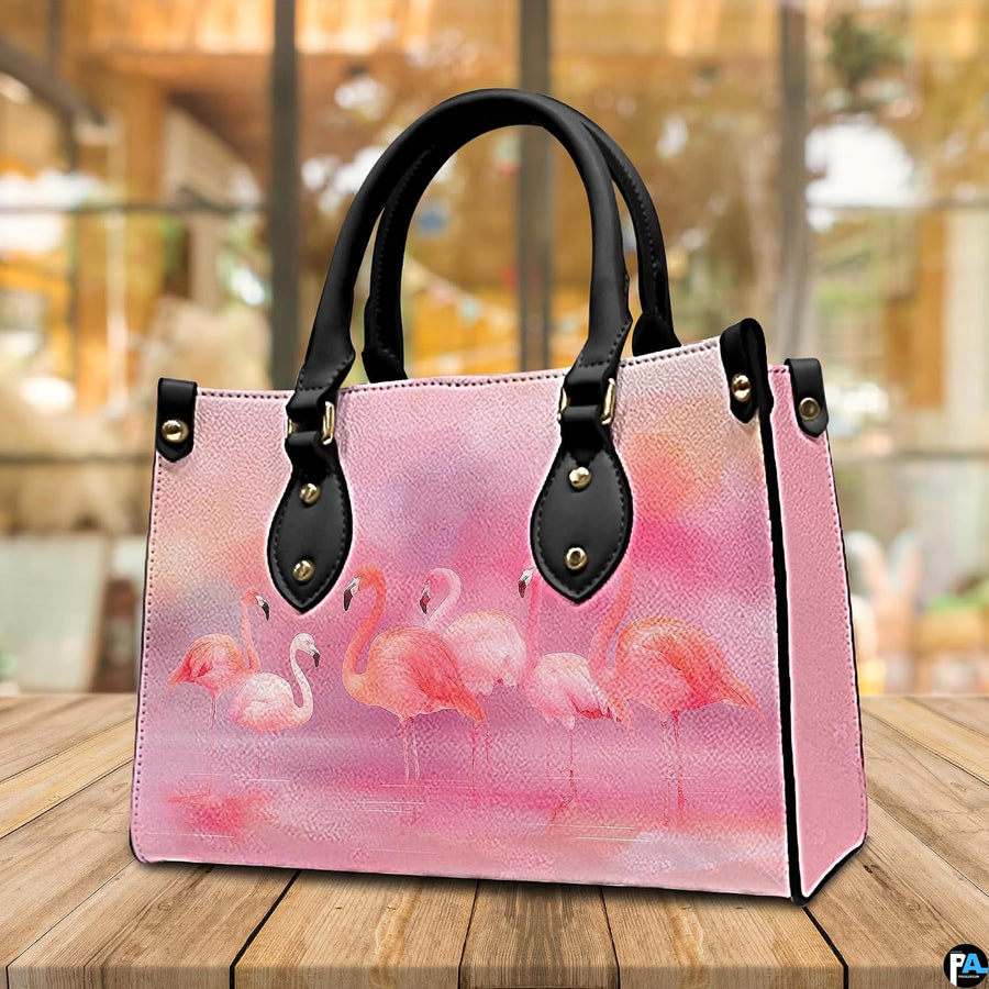 Side profile perspective of the handbag showing structured side panel and hardware.