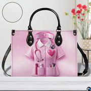 Three quarter view of structured pink nurse handbag showing side and front layout