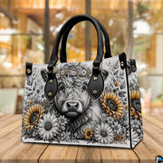 Atmospheric wooden table display showcasing detailed charcoal cow sketch with sunflowers