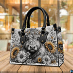Atmospheric wooden table display showcasing detailed charcoal cow sketch with sunflowers