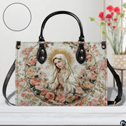 Virgin Mary rose wreath handbag shown on a wooden tabletop with texture swatch