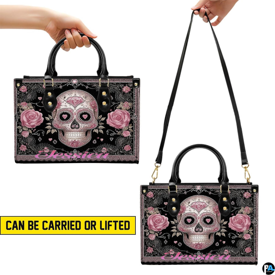 Top-down view displaying interior compartment and black carrying handles of the handbag.