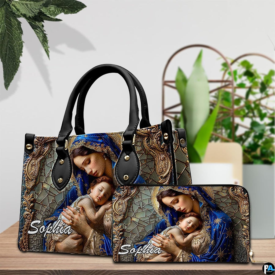 Coordinated sacred art duo positioned on tabletop beside green indoor plant.