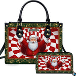 Holiday handbag and matching wallet set featuring Santa Claus emerging from a checkered vortex spiral.