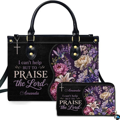 Purple floral hummingbird cross handbag and matching wallet set on white backdrop