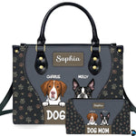 Front view of slate and charcoal dog handbag and matching wallet featuring hound and bulldog illustrations.