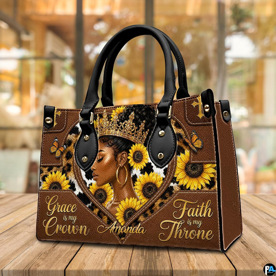 Perspective tabletop view of the melanin queen sunflower design resting on wooden surface.