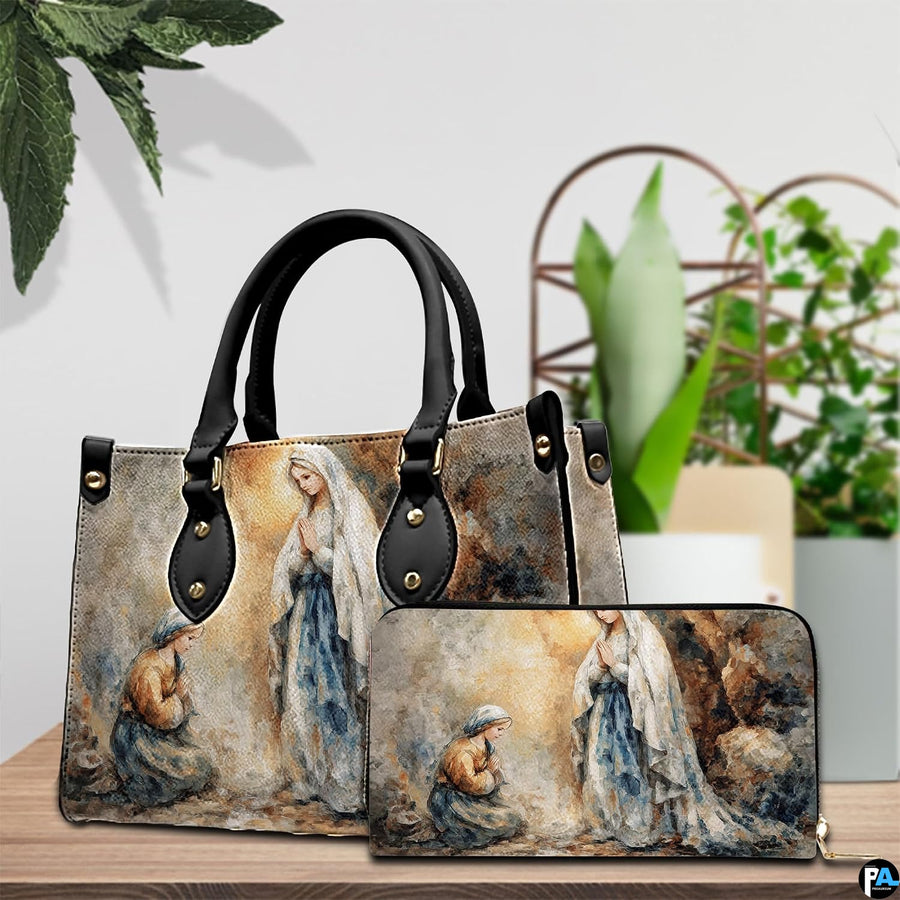 Matching handbag and zippered wallet set displayed together with Lourdes artwork.