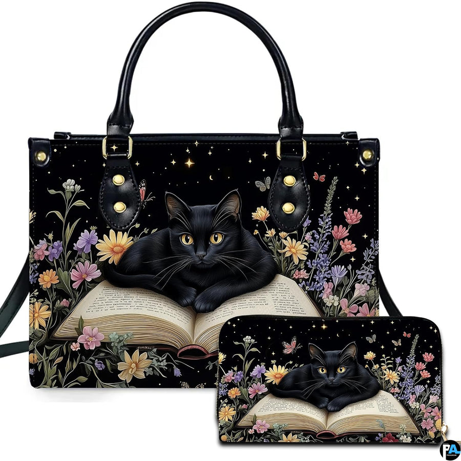 Studio presentation showing bookish black cat artwork alongside matching companion accessory on plain white surface.