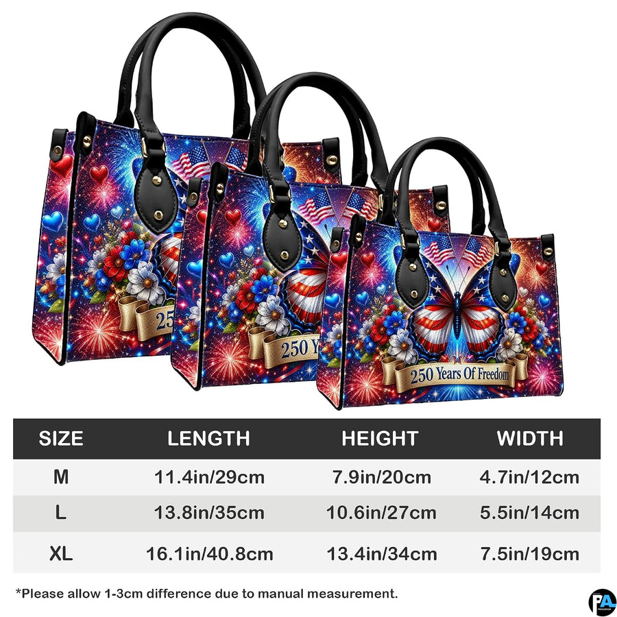 Side perspective view showing patriotic handbag and wallet pair