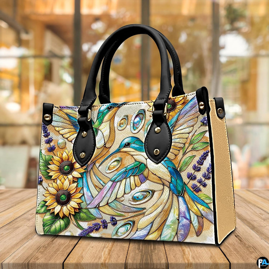 Side profile view of sunflower botanical handbag showing structured silhouette and clean depth.