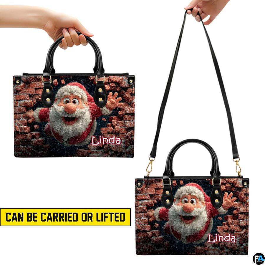 Demonstration of handbag carried by top handle and lifted with shoulder strap.