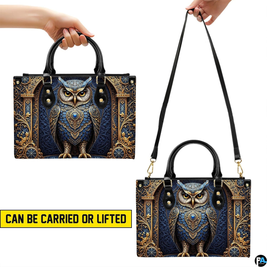 Front view of baroque owl handbag featuring gilded archway and royal blue damask pattern