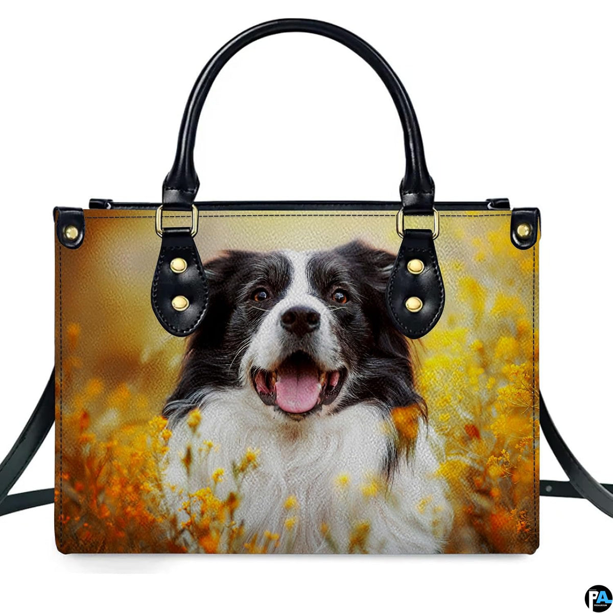 Demonstration of canine pet portrait artwork on upright handbag amidst blooming yellow flowers.