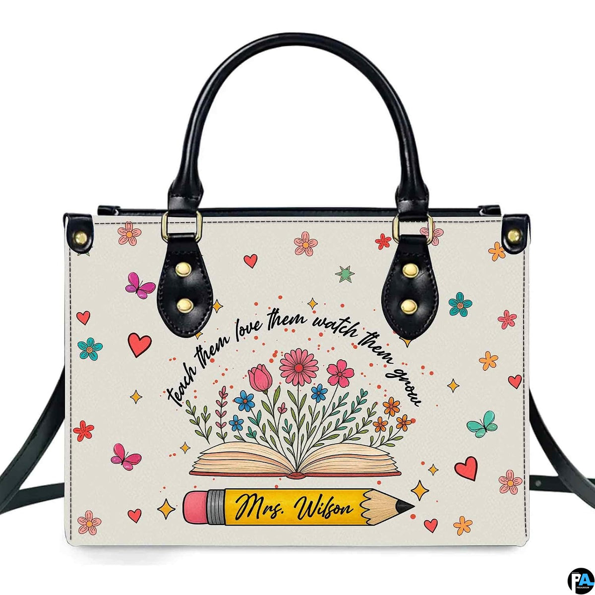 Botanical floral book teacher handbag featuring open book blooming with wildflowers and yellow pencil.