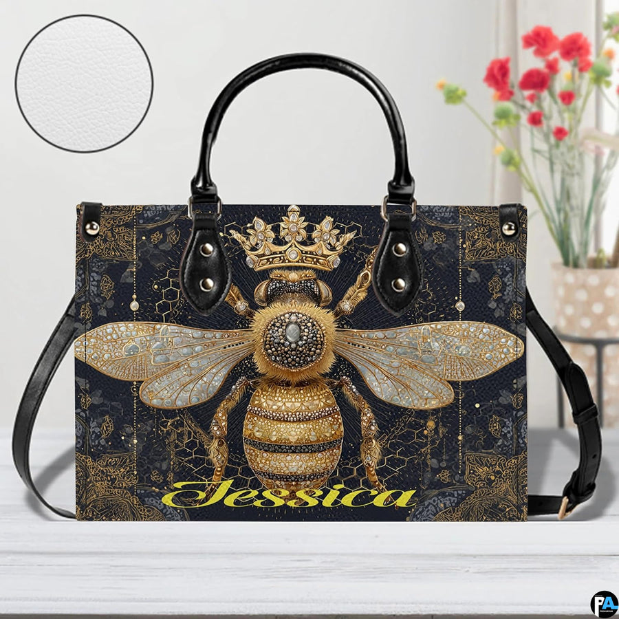 Interior compartment view of queen bee handbag showing inner lining and organization.
