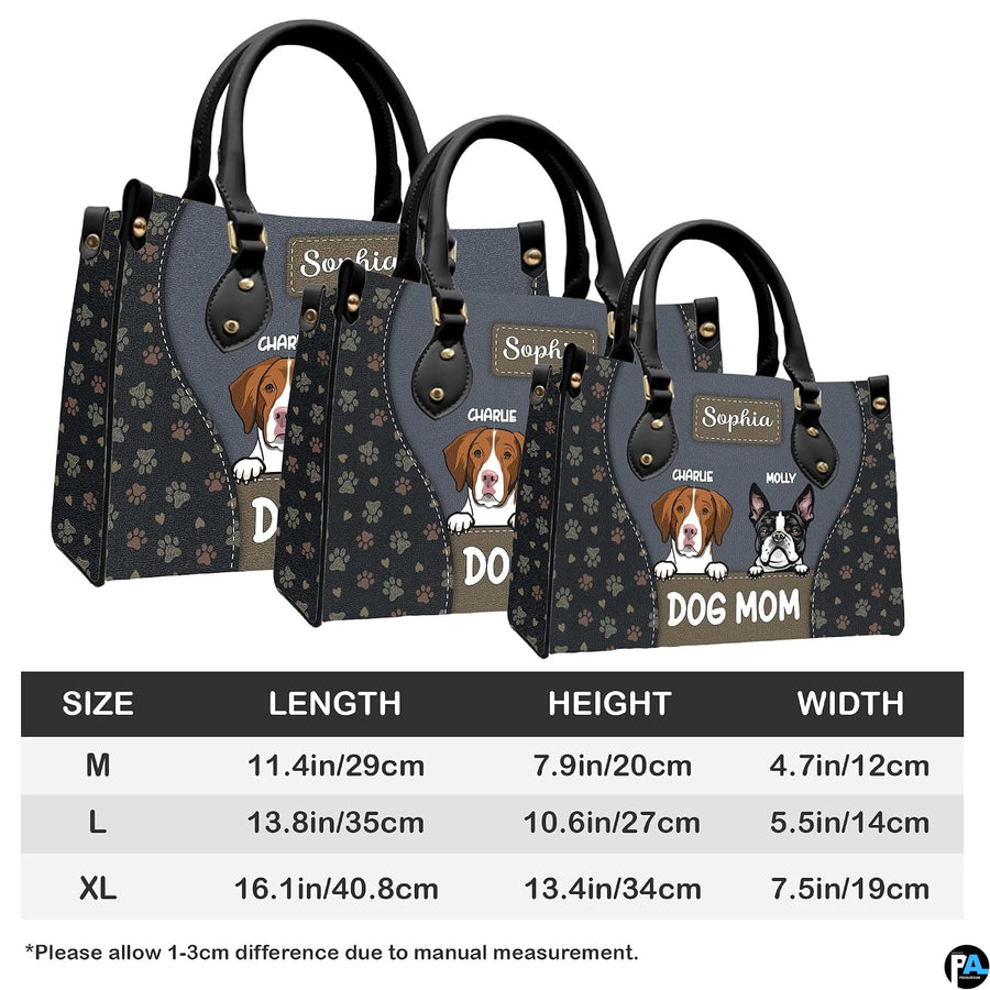 Full set presentation of slate grey dog handbag and matching wallet displayed on neutral background.