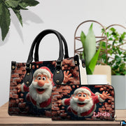 Handbag and coordinated wallet set displayed on wooden tabletop beside green houseplant.