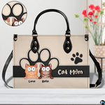 Alternative angle view showing peeking cats handbag and wallet matching pair