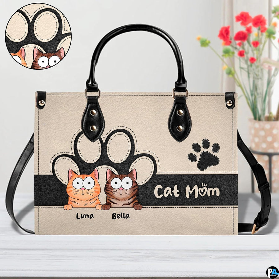 Alternative angle view showing peeking cats handbag and wallet matching pair