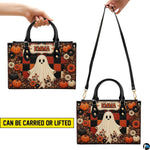 Carrying style infographic showing handheld top handle grip and shoulder strap option for the satchel.