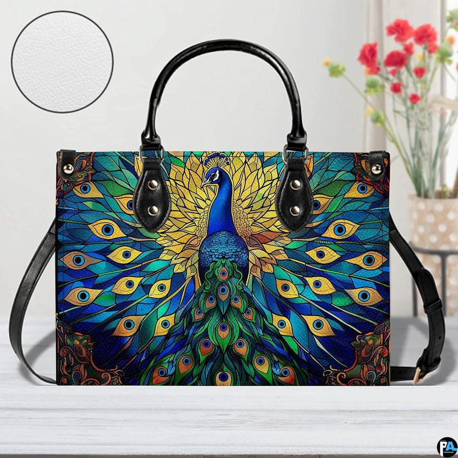 Front view of peacock stained glass pattern handbag with shoulder strap