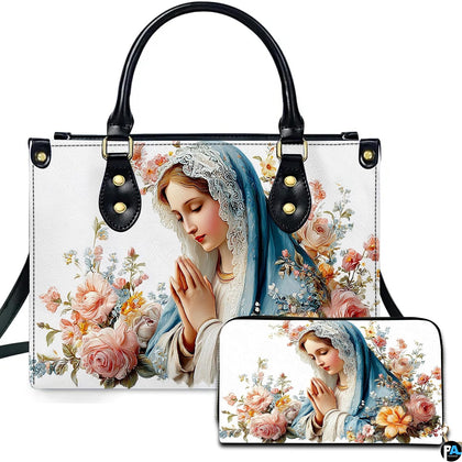 Lace mantilla praying Virgin Mary handbag and wallet set with blush roses on display.
