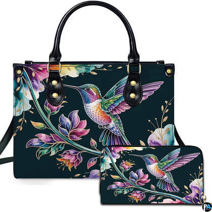 Midnight teal handbag and matching wallet set featuring an iridescent hummingbird and watercolor flowers.