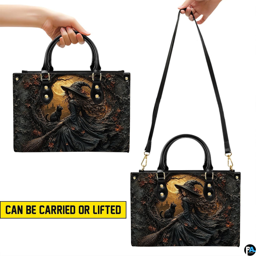 Carrying demonstration presenting handheld and shoulder styling options for the witch and black cat art accessory.