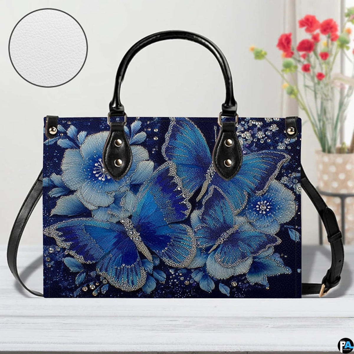Perspective angle view of butterfly handbag highlighting side depth and seamless pattern alignment.
