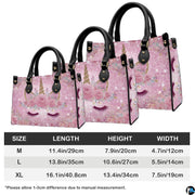 Coordinated display showing both handbag and wallet with matching unicorn artwork.