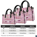 Coordinated display showing both handbag and wallet with matching unicorn artwork.