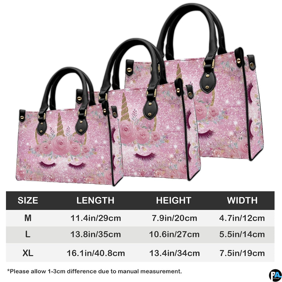 Coordinated display showing both handbag and wallet with matching unicorn artwork.