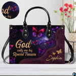 Top view showing black carrying handles and main zippered opening of galaxy butterfly purse.