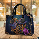 Side profile of clockwork dragonfly handbag showing clean edges and structured silhouette