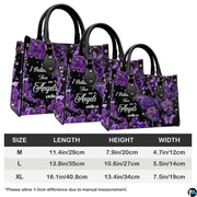 Top-down view of purple hydrangea butterfly cross handbag showing dual carrying handles.