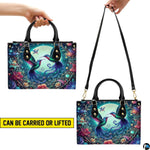 Handbag displayed in two carrying styles held by top handle and shoulder strap on white background.